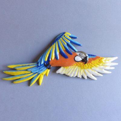 Miniature de ara bleu en vol